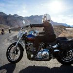 man-riding-touring-motorcycle